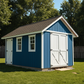Blue storage shed with white doors in a backyard setting