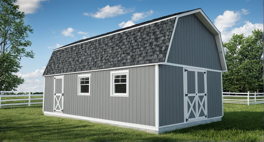 Gray storage building with white trim on a grassy area with trees and a fence in the background.